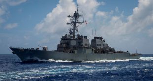 China says it warned away U.S. warship in South China Sea