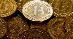 Bitcoin falls to 22-month low as stock markets tumble